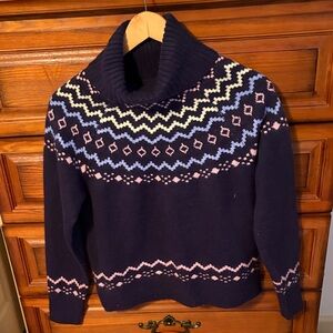 Navy Turtleneck Sweater with Pastel Accents